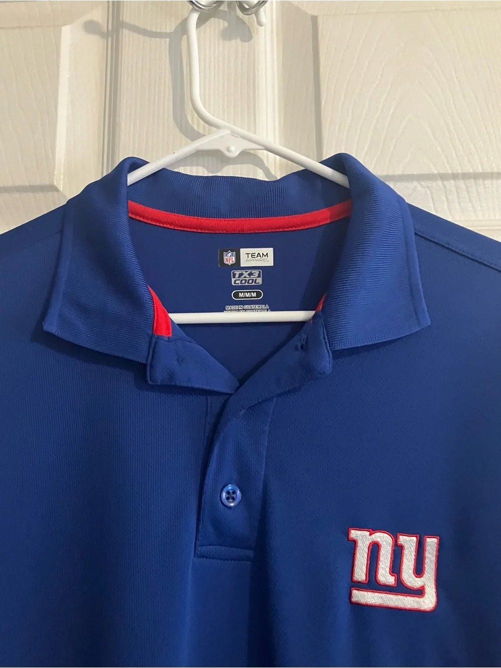 Youth New York Giant’s Royal Blue Polo with Red Side Panels Size M